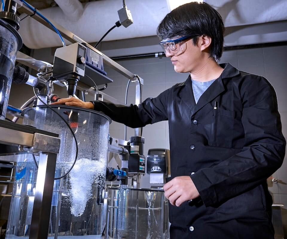 A person working on a water desalination system