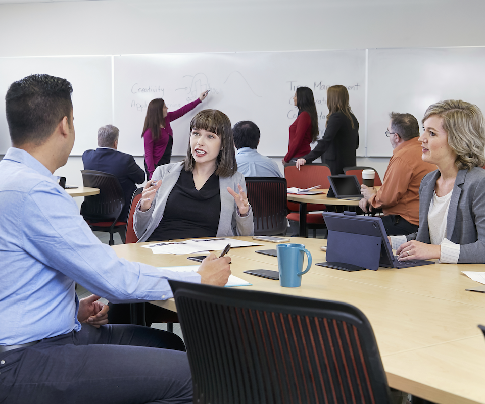 People collaborating in a meeting room