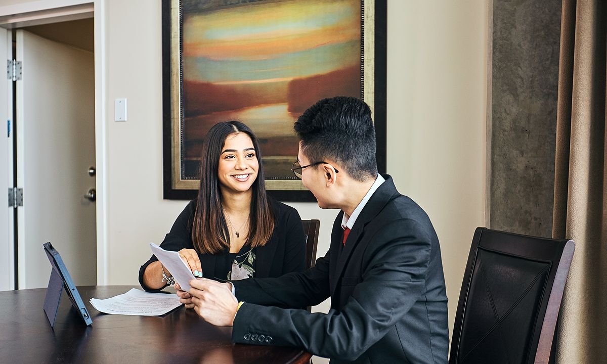 business meeting between two people at a table