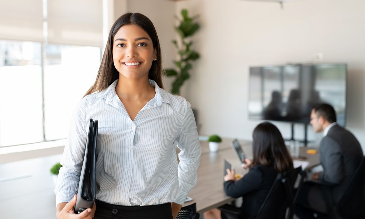 businesswoman with folder in conference room