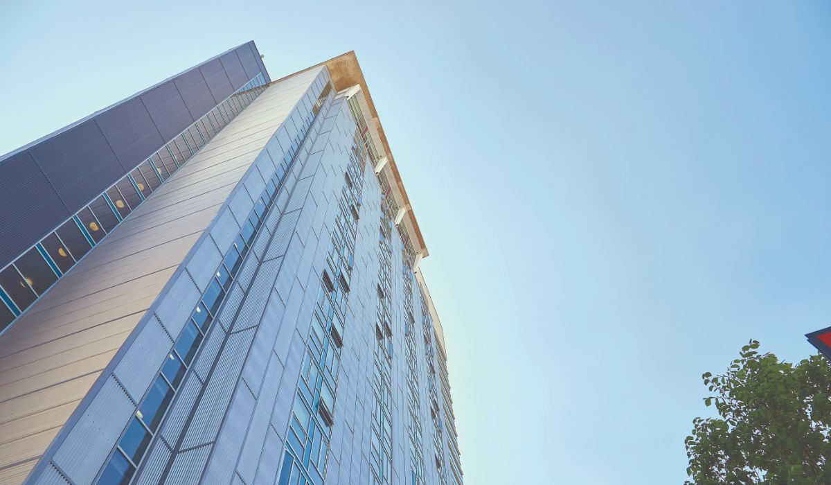 Upward photograph of the residence tower on SAIT campus
