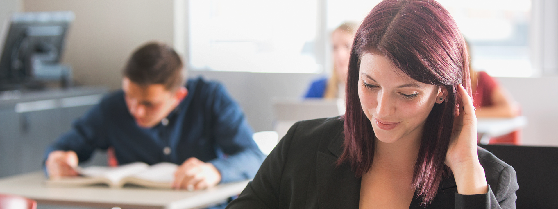 Student studying in a classroom