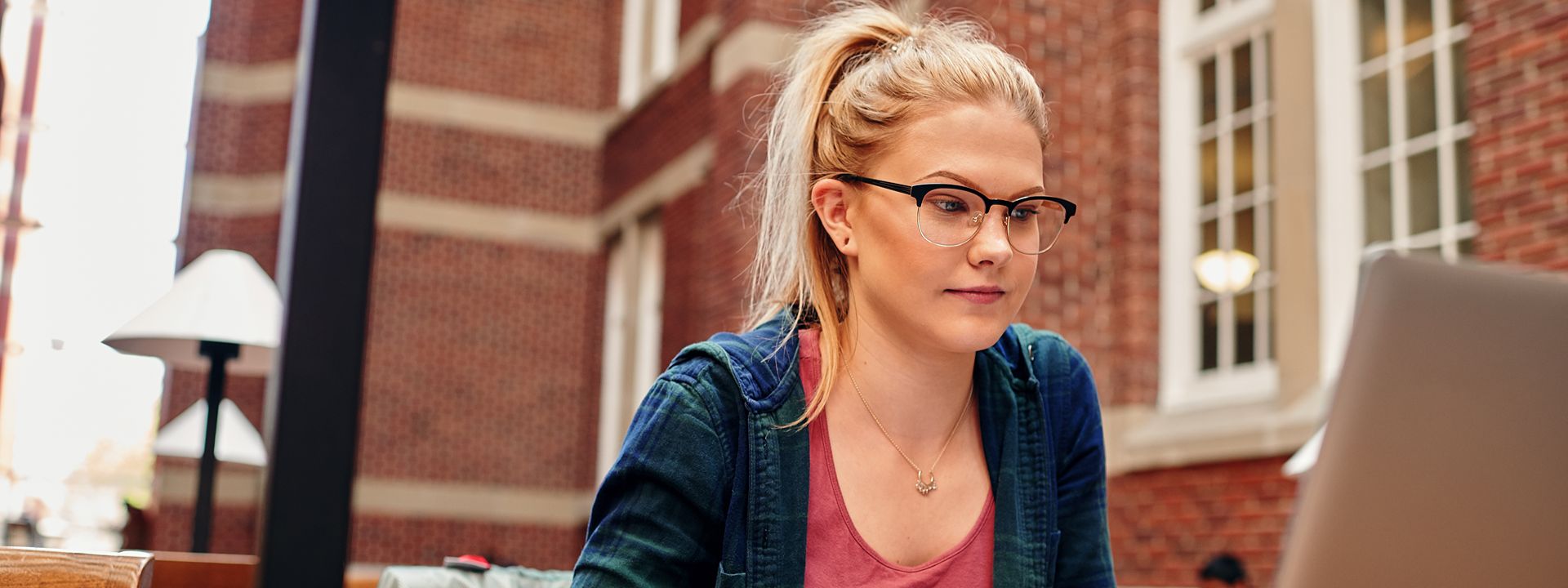 person using laptop at stan  grad center