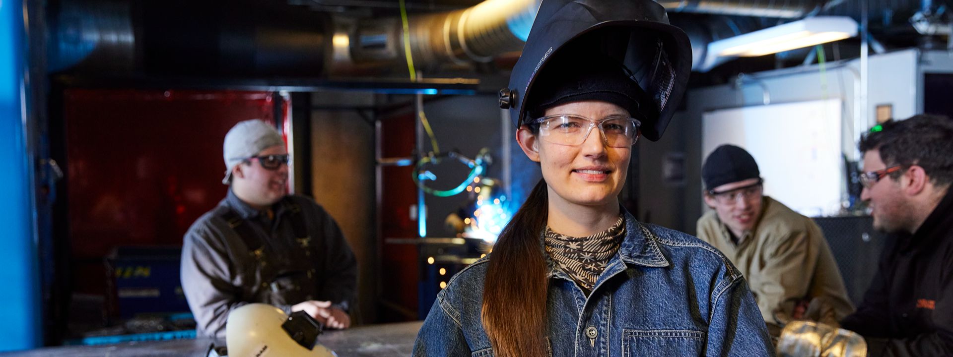 welding workshop group participant in safety gear