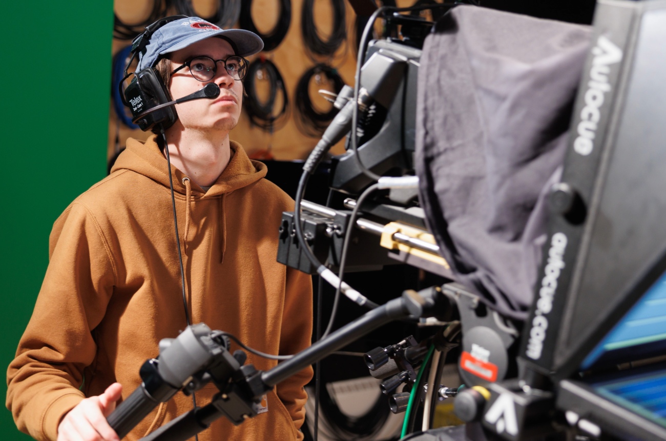 Film student using equipment