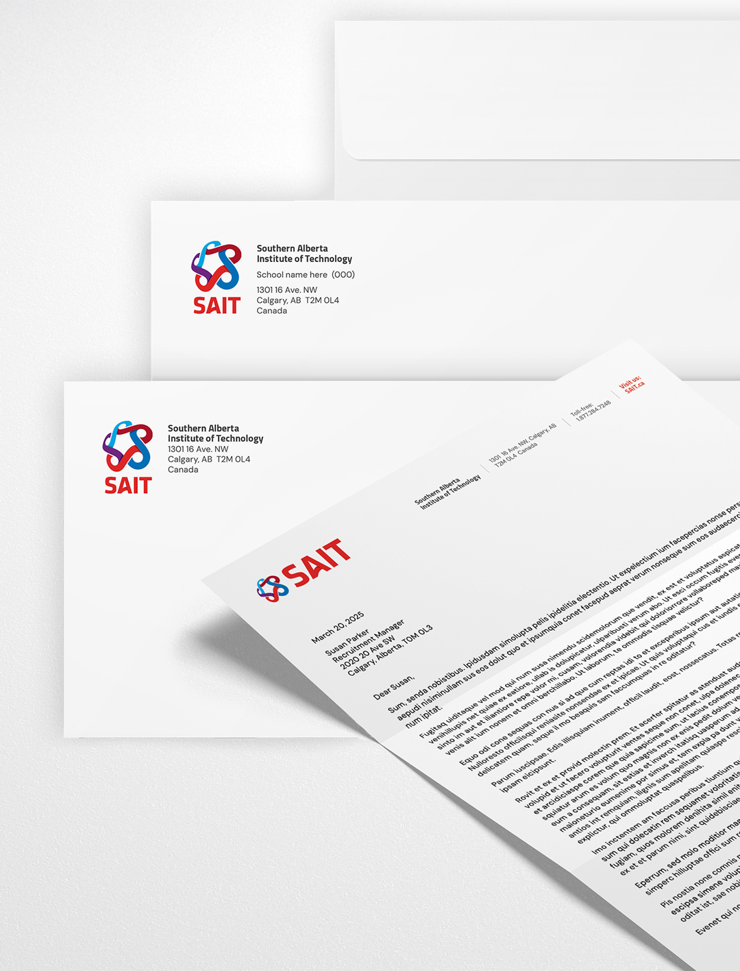 SAIT branded letterheads and envelopes.