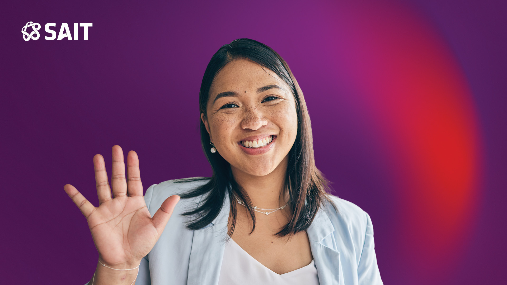 Person waving during Zoom meeting