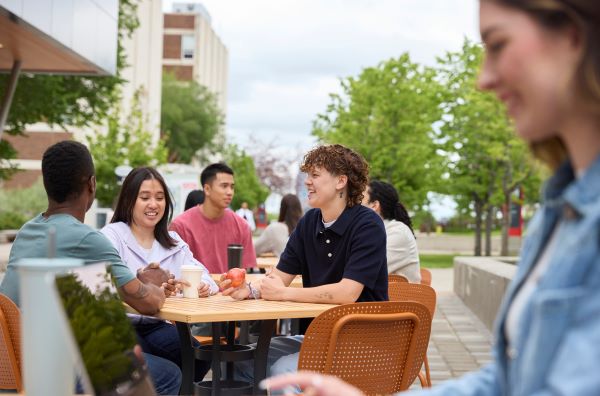 A group of students sitting at a table