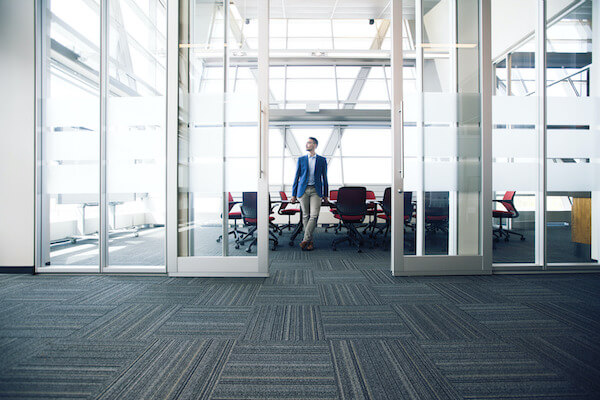 Man standing in a boardroom