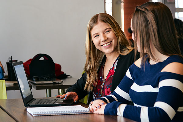 two students study in Johnson Cobbe