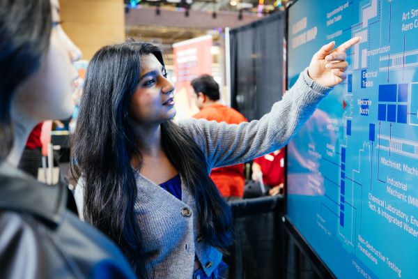A student using a screen to search