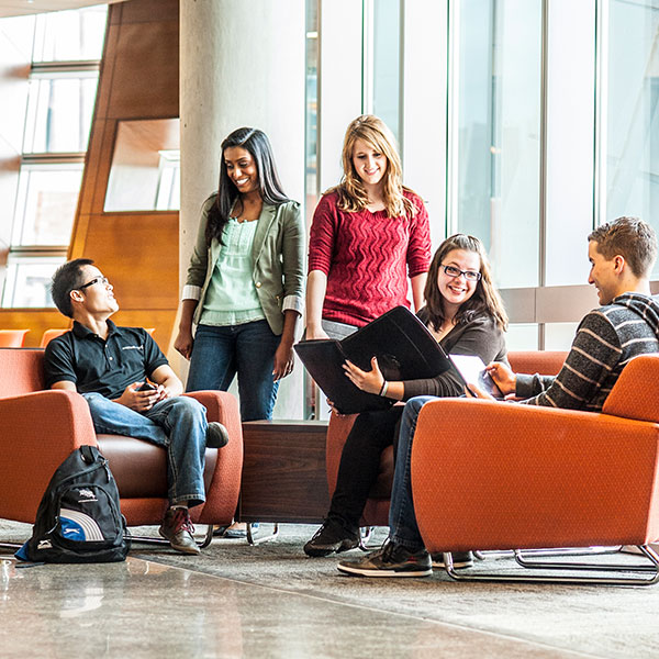 Group of students talking with each other