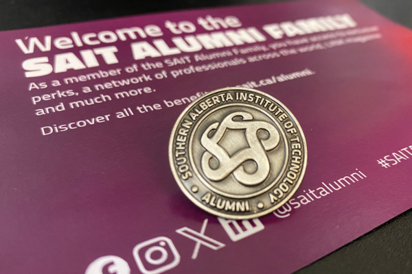 close up of Alumni pin