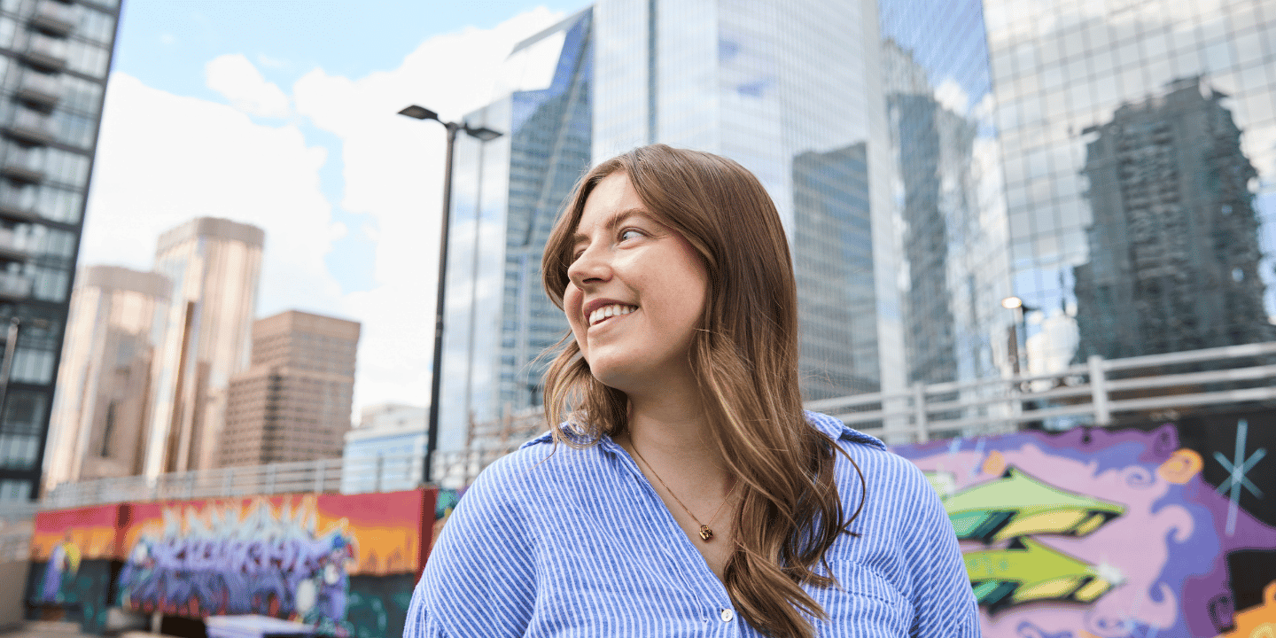profile of young woman in city