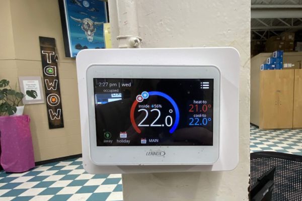 Thermostat mounted on a wall