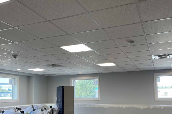 Lighting and window retrofits in a light room.