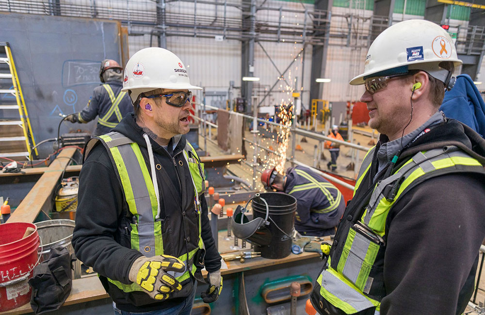 Shipbuilders working on a project