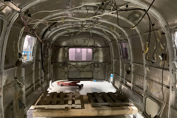 Interior of a stripped vintage 1973 Airstream trailer
