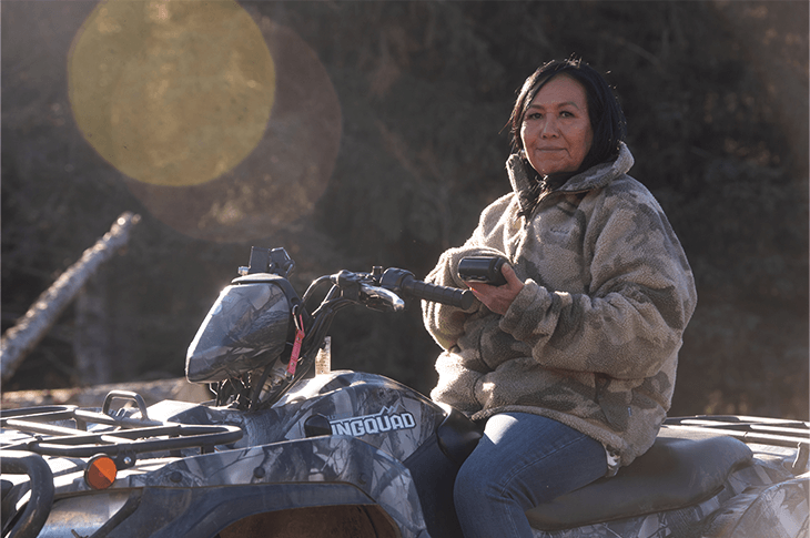 Marcella Brooks sitting on an atv at the mill