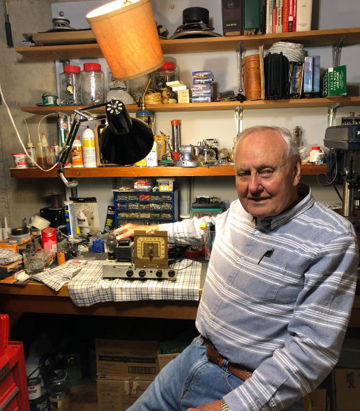 Mel Hoyme sitting at a desk