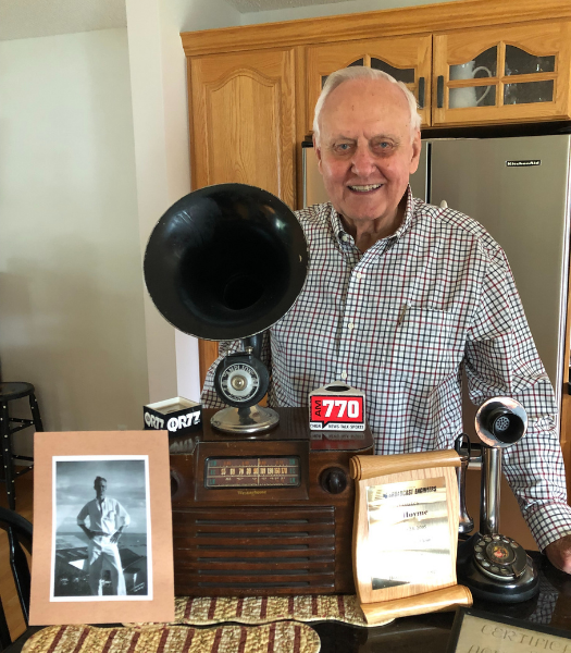 Mel Hoyme with vintage broadcast equipment