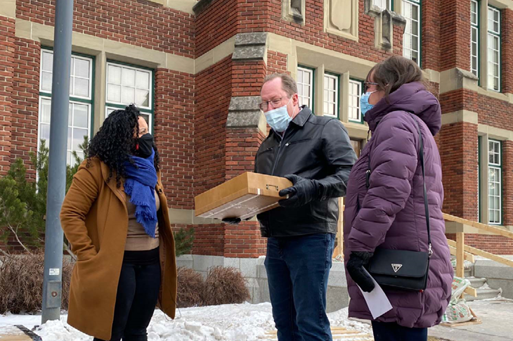 A couple receiving a package