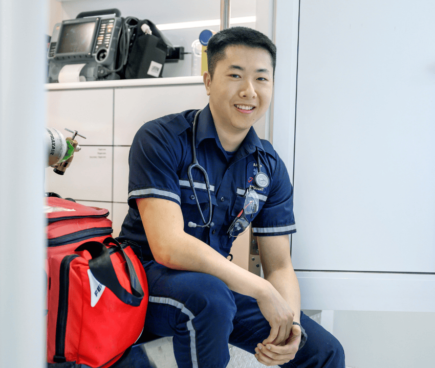 photo of young man in a student paramedic outift