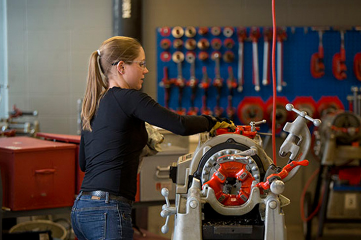 girl working on equipment