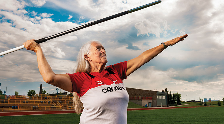 older female preparing to throw javelin