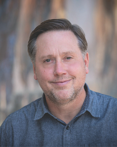 man with beard, glasses and hat