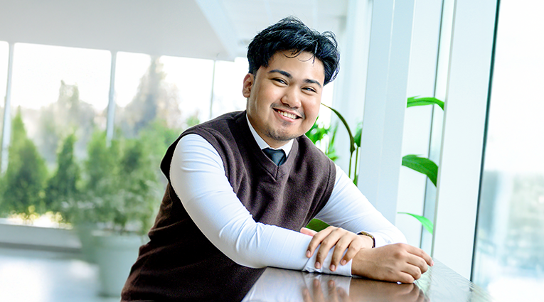 Portrait of professionally dress young Filipino man