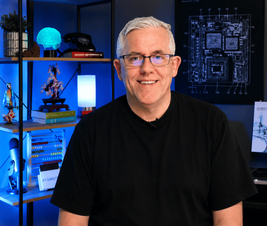 White male in black tshirt in podcast studio