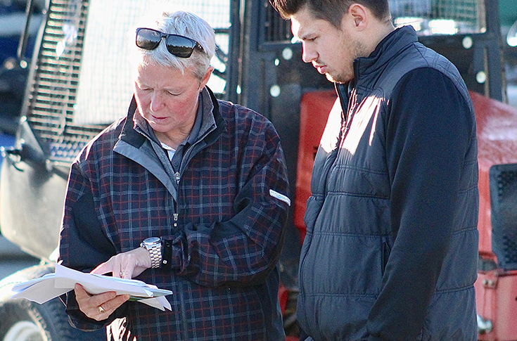 SAIT Trojans golf team advisor Tiffany Gordon (left).