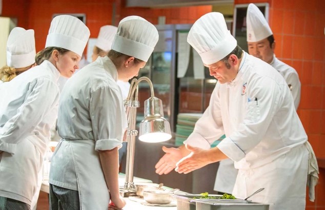Culinary instructor with students