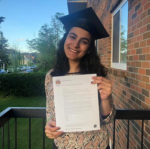 Kajol Bhatia wearing a grad cap