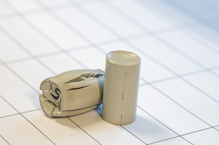 A side by side comparison of a resin sample before and after conducting a crush resistance test