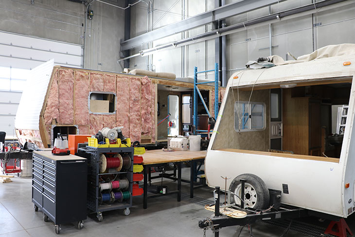 A trailer under repair in a SAIT lab.