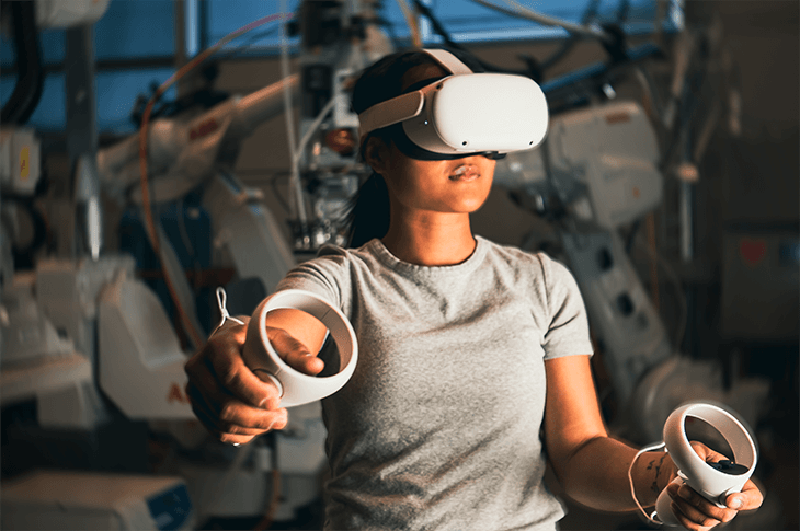 A woman wearing VR equipment