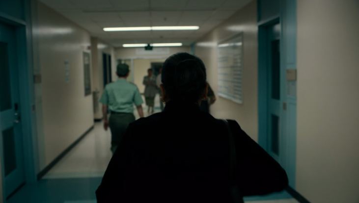 Characters from The Last of Us walk down a Jakarta hospital hallway.