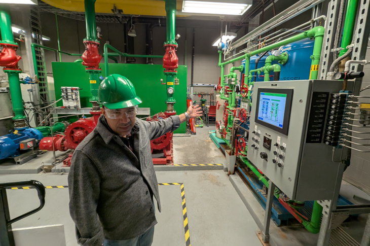 Jay Campo, Academic Chair, Process Operations, MacPhail School of Energy leads a tour of the Cenovus Energy Centre.