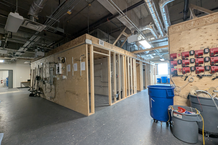 Electrician pods made of wood in the pre-employment electrician lab.