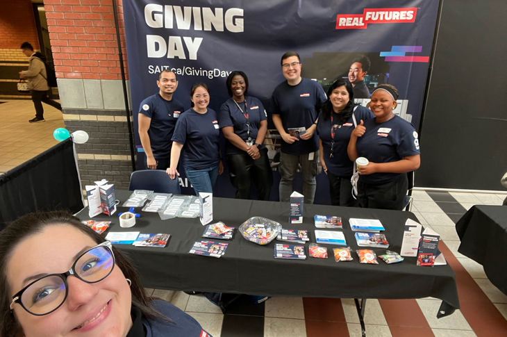 Group shot at the booth.