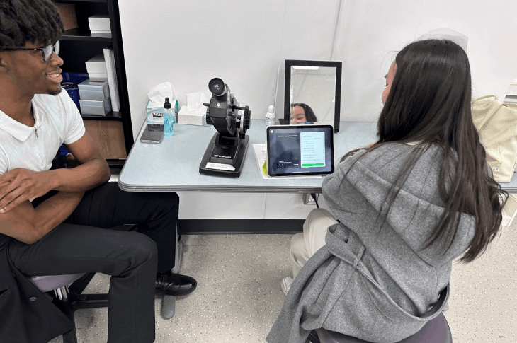 SAIT Optician alumni test the augmented reality application.