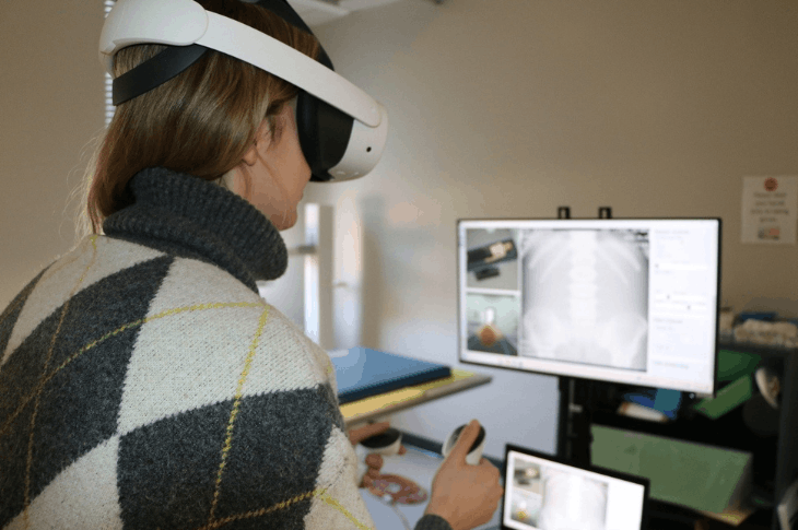 A SAIT employee tests the virtual reality technology used in Medical Radiologic Technology courses.