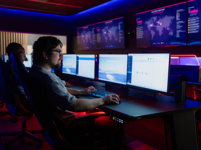 Student works on a computer in SAIT’s Cyber Range lab.