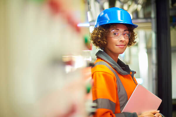 a woman in a hard hat