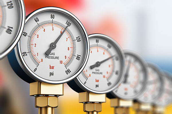 A row of pressure gauges.