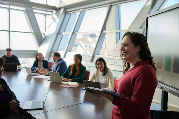 A group of people working in a boardroom