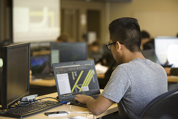 Student studying on a computer