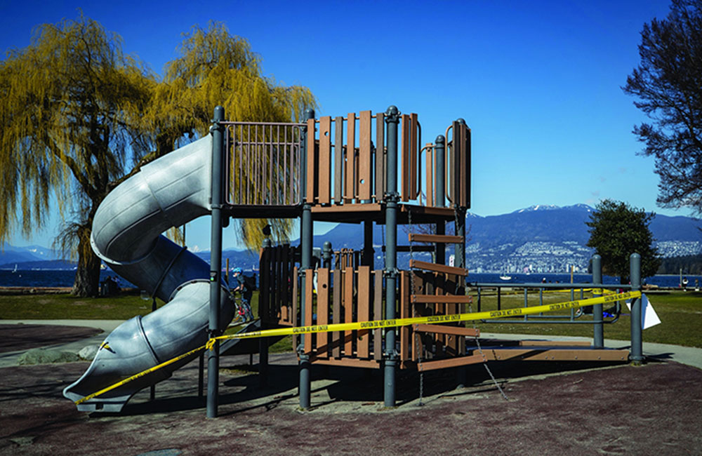 Caution tape surrounds playground equipment after the City of Vancouver closed all playgrounds in the city due to concerns about the spread of the COVID-19 in Vancouver on Saturday, March 21, 2020.